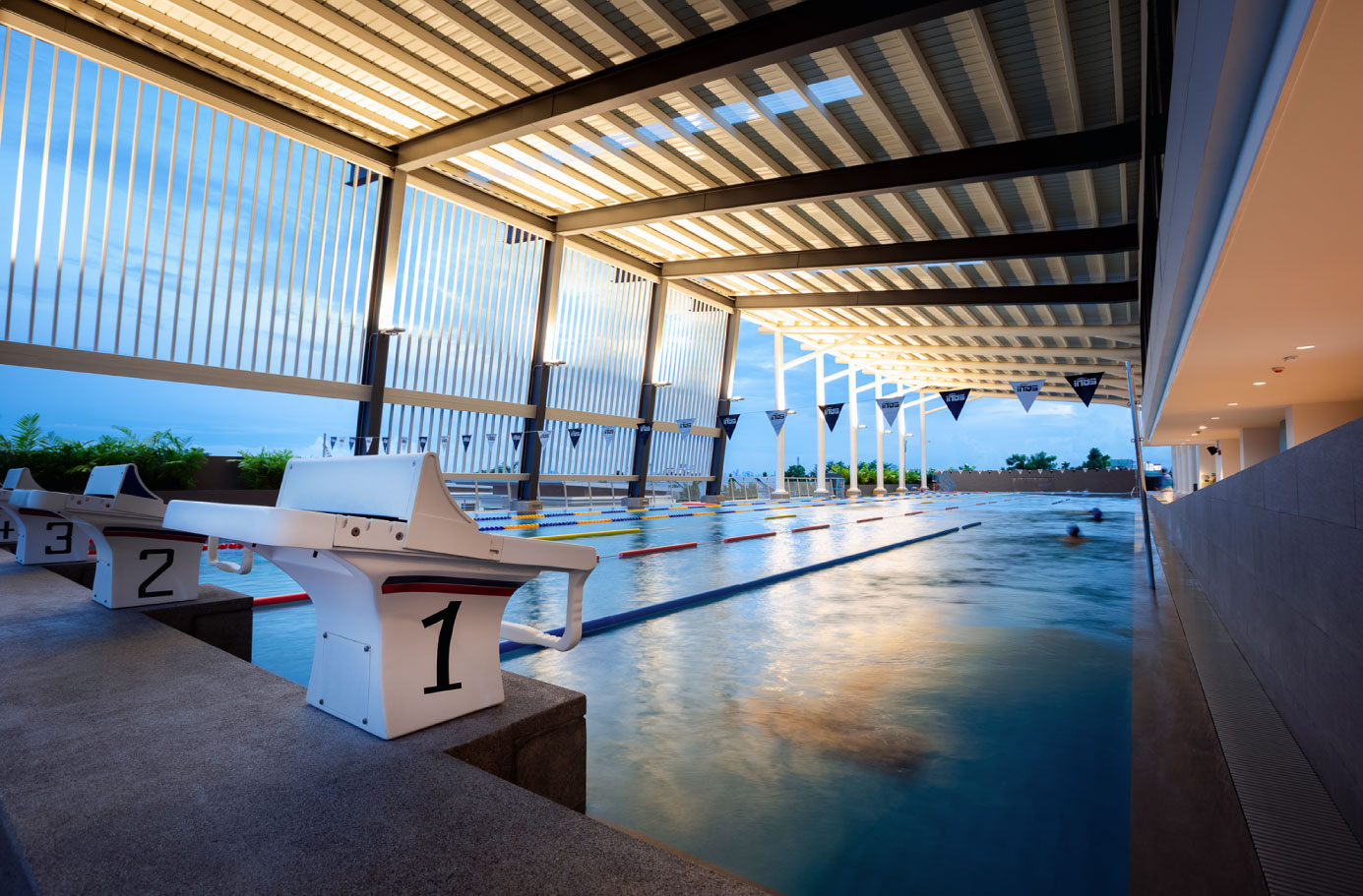 STAGE pool lanes and starting blocks at dusk